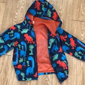 Adorable, children’s dinosaur rain jacket